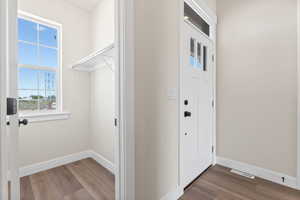 Foyer entrance featuring hardwood / wood-style flooring