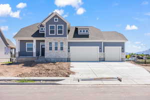 View of front facade with a garage