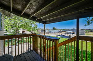 Wooden deck to backyard lawn