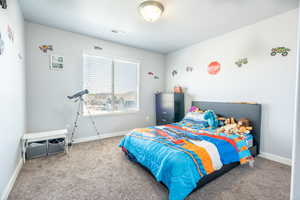 View of carpeted bedroom