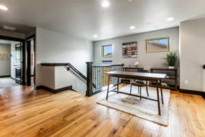 Office with light wood-type flooring