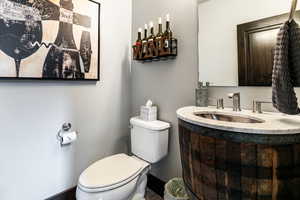 Bathroom with toilet and vanity