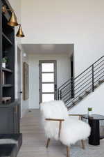 Foyer entrance featuring light hardwood / wood-style floors