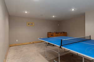 Game room with concrete floors