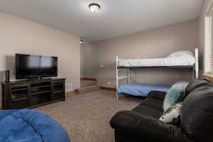 View of carpeted bedroom