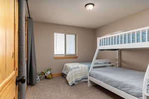 Bedroom featuring carpet