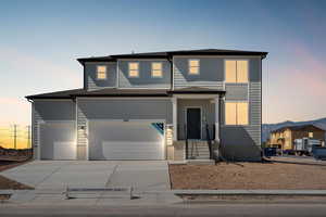 View of front of home with a garage