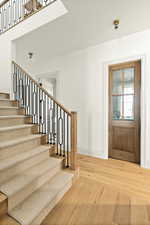 Entrance foyer featuring wood-type flooring