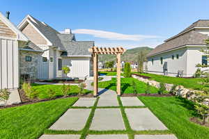 View of patio featuring a mountain view and a pergola