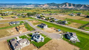 Drone / aerial view featuring a mountain view