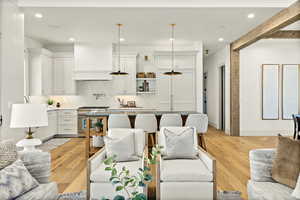 Living room with light wood-type flooring