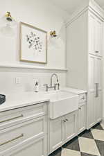 Laundry room with sink