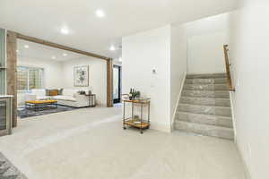 View of carpeted  lower level living room