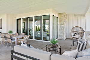 View of patio with an outdoor living space