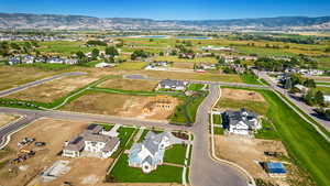 Birds eye view of property with a mountain view