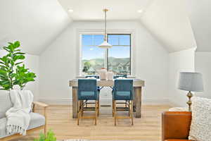 Accessory Apartment Dining space featuring lofted ceiling and light hardwood / wood-style flooring