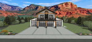 View of front of property featuring a garage, a balcony, a mountain view, and a front lawn