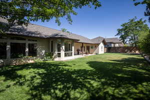 View of yard with a patio area