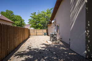 View of yard with central AC unit