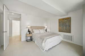 Bedroom with light tile floors