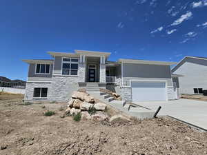 View of front facade with a garage