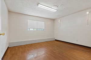 One of 4 smaller bedrooms with Jack and Jill half bath