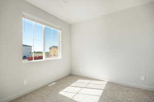 View of carpeted empty room