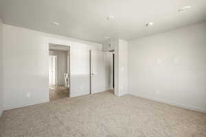 Unfurnished bedroom featuring carpet