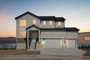 View of front of home with a garage