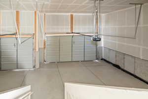 Garage featuring a garage door opener