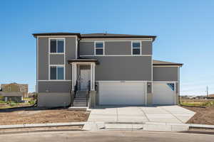 View of front of house featuring a garage