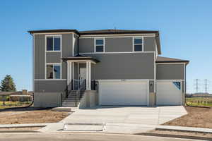 View of front of house featuring a garage