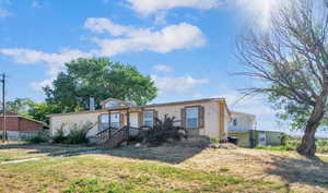 View of front of home with a front yard