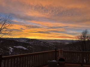 Deck at dusk with a mountain view