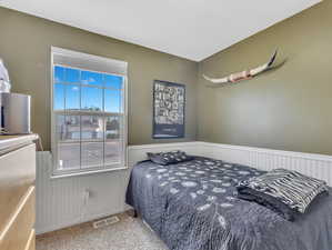 Bedroom featuring carpet