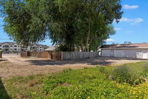 View of yard with a garage