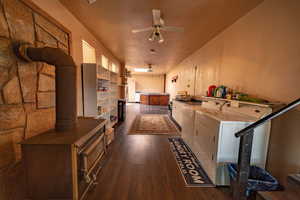 Laundry room on main floor located of the kitchen area with an extra exit outside.  Hot tub is located next to the outside entrance for easy access.