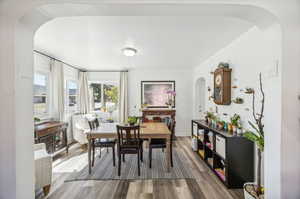 Dining room with hardwood / wood-style flooring