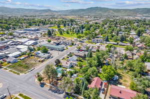 Birds eye view of property with a mountain view