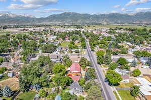 Birds eye view of property with a mountain view