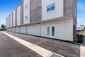 Exterior space featuring french doors and a garage