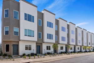 View of property featuring central AC unit