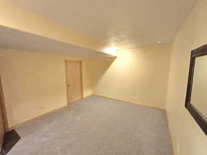 Spare room with carpet flooring