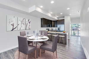 Dining space with light wood-type flooring