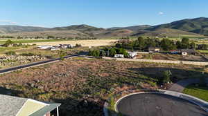 Drone / aerial view featuring a mountain view