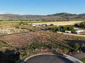 Birds eye view of property featuring a mountain view