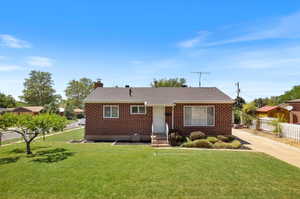 View of front of home with a front lawn