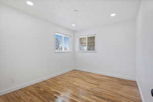 Empty room featuring light hardwood / wood-style floors