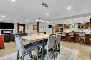 Open concept living & dining area perfect for relaxing & entertaining.