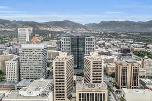 Stunning high-rise condo with breathtaking city & mountain views.